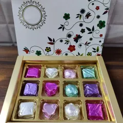 My homemade chocolate gift boxes are perfect for any occasion. I hand-wrap each chocolate and arrange them in these beautiful boxes, ready for gifting.