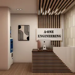 The reception area designed for 'A-ONE Engineering'. The desk features striped wood paneling, and the company's name is prominently displayed with backlighting, reinforcing brand identity from the moment a client walks in.