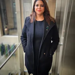 A professional portrait taken during a conference. These events are opportunities to learn, connect, and represent my firm and my mission.