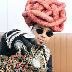 A close-up look at my Navratri Day 4 outfit. The intricate turban, the statement rings, and the shades all come together to create a look that's bold and confident.