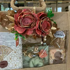 A warm welcome to the family! This welcome hamper for a groom-to-be was packed in a sustainable jute bag and filled with goodies and a heartfelt note from the cousins.