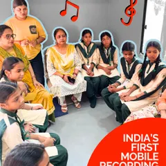 Students from a local government school gather inside the Music Bus for an interactive session. We designed this space to be a concert hall of curiosity, where both students and teachers can discover the joy of music.