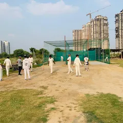Players getting ready for their turn at the nets. The environment is focused and disciplined, with everyone working towards improving their game.