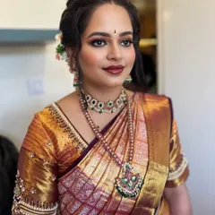 Another beautiful angle of this classic engagement makeup. The look is timeless, elegant, and perfectly suited for a traditional South Indian ceremony.