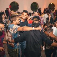 A group hug on the dance floor. This is the kind of unity and fun that music creates. Pure joy.