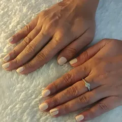 You can never go wrong with classic nude nails. This client wanted a simple, clean look, and we added a single, fine gold line on one nail for a tiny bit of glam.