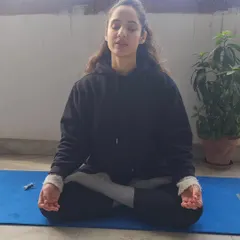 Seated in Padmasana for meditation. A consistent and mindful practice, whether through movement or stillness, is the path to self-analysis and transcending your own perceived limits.