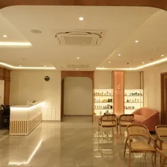 A glimpse into the waiting area of our Electronic City clinic. We've created a serene and stylish space for you to relax before your appointment with our expert team.