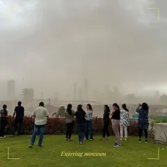 The team enjoying a monsoon storm from our office terrace. Moments like these, appreciating the power and beauty of nature, often inspire our work and reinforce our commitment to designing with the environment in mind.