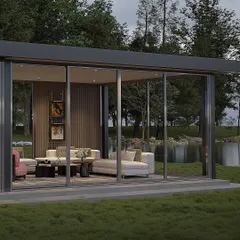 An identical view to the previous, this image reinforces the serene setting and the seamless integration of the modern structure within a natural, waterside landscape.