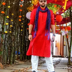 Dressed for the occasion at a Haldi ceremony. Rocking a red kurta to bring the right vibes for the daytime festivities. It's all about matching the energy of the event, from the music to the look.