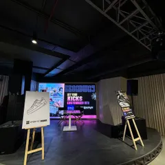The stage setup for our "Get Your Kicks Customised" event with Broadway. We provide branded easels, stage backdrops, and professional audio-visual equipment for a complete event solution.