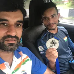 Celebrating a silver medal win at the ISSF World Cup in South Korea. International success is a journey we take together.