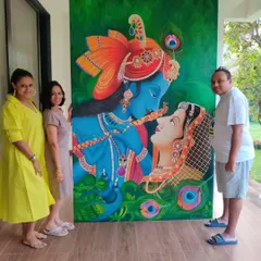 Pictured here with my wonderful clients and one of my favorite commissions. It was such an honor to create this gorgeous Radha Krishna painting for their villa. Seeing my art find its perfect home and bring joy to others is the best part of what I do.