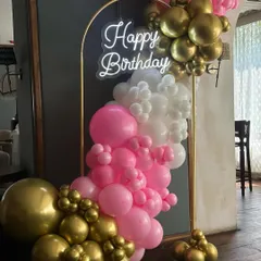 Another angle of the mini balloon backdrop, showing how it can be a perfect, compact photo corner for birthdays and other celebrations.