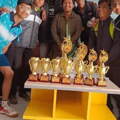 A table full of trophies from the Haryana District Tournament. This image represents the collective success of our team and the winning culture we cultivate at the academy.