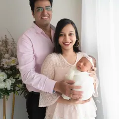A classic family portrait, with everyone looking towards the camera, celebrating their new arrival. These are the timeless images that will be treasured on walls and in albums for generations.
