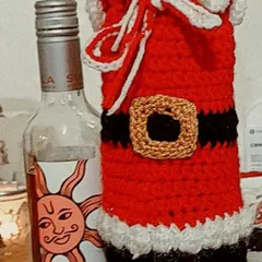 It's heartwarming to receive pictures from clients. Here is my Santa sack bottle cover being used to add some festive cheer.