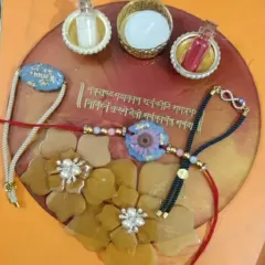 I love putting together these complete Rakhi platters. This set includes a decorative resin platter that holds the roli and chawal, a diya, and a selection of my handmade rakhis. It’s everything you need for the Raksha Bandhan ceremony.