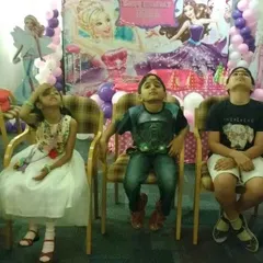 The concentration is real. This is a fun and silly game where kids have to try and get a biscuit from their forehead into their mouth without using their hands. It always results in a lot of giggles.