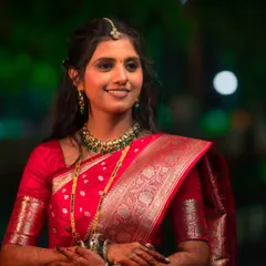 A close-up portrait of this bride's reception look. I created a soft smokey eye and ensured her skin had a flawless, glowing finish that looked stunning under the evening lights.