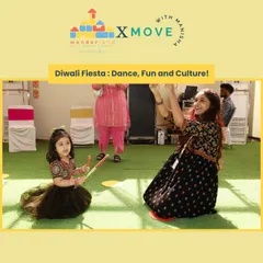 Celebrating Diwali with a special Dandiya fiesta for kids. I'm showing one of our youngest movers how to hold the dandiya sticks. We make sure our festive events are fun and accessible for all ages.