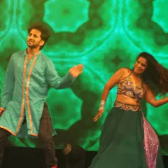 In the zone during a duet performance. The connection with a dance partner and the audience is an electric feeling that I teach my students to harness.