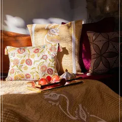 I believe your home should be a legacy. Here, the rich, pomegranate-inspired hues of my Anardana collection come to life, blending plush velvet textures with intricate embroidery to create a space that feels both grand and deeply personal.