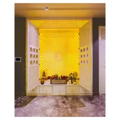 The true heart of this Gurgaon home is the temple. I designed it with white jaali doors, an Om symbol radiating light, and subtle mantra engravings. It’s a space that holds emotion, tradition, and quiet energy.