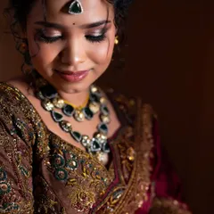 A close-up of Lavanya's eye makeup. The shimmering eyeshadow and defined lashes make her eyes the focal point of this stunning look.