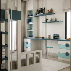 A view of the integrated study area in the same kids' room, featuring a long desk and open shelving. This creates a dedicated zone for homework and creative projects, all within a cohesive design.