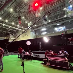 The production area for an e-sports event, showing the green screen and camera crane. Our venue accommodates the extensive technical and broadcast needs of modern e-sports.