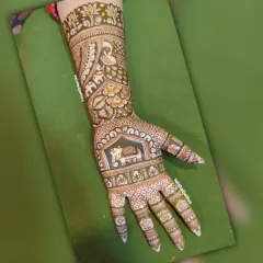 A unique design featuring a 'Tapasvi' (ascetic) and a Ganesha motif. This kind of thematic art is perfect for clients who want something deeply personal and spiritual.