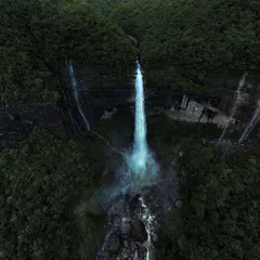The powerful plunge of Nohkalikai Falls, seen from above. The sheer scale of this waterfall is something you have to witness to believe.
