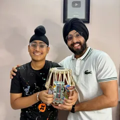 Another one of my bright students receiving a gift during our academy meetup. He even brought me a handmade miniature tabla, which was such a sweet gesture.