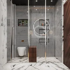 A bold and graphic bathroom design featuring a walk-in shower with black-and-white striped walls. The clear glass partition and marble flooring keep the space feeling open and bright.