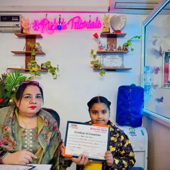 Celebrating another student's success as she receives her certificate of completion. Each certificate marks a significant step in her journey to mastering mental math.