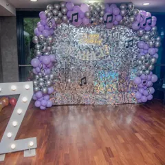 We transformed the venue into a dazzling disco for Mahati's 7th birthday! This sparkling sequin wall, complete with a custom neon sign and balloon arch, set the stage for a day of dancing and fun. We handle all the decor to make your theme come to life.