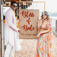 Welcome to the "Bliss of Bali," our theme for Aditya and Supreetha's yellow-themed Holi and Haldi celebration. The couple's vibrant, tropical-print outfits were a perfect match for the fun, destination vibe.