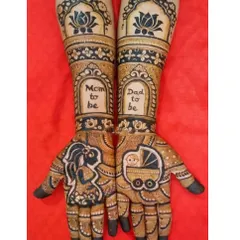 I love creating custom mehandi for baby showers. This design features a silhouette of an expecting mother, a baby in a pram, and the words "Mom to be" and "Dad to be" to celebrate the new journey.