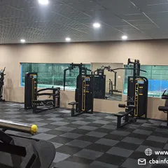 An overview of our fully equipped professional gym, featuring a wide range of strength machines and cardio equipment to support diverse fitness goals.