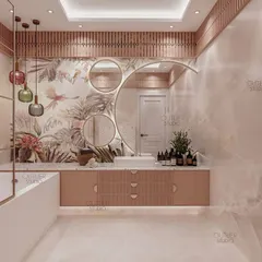 Whimsical wonders await in this playful kids’ bathroom. The design features a beautiful floral and bird-themed wallpaper, a unique multi-circle mirror, and colorful pendant lights.