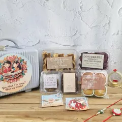 A hamper that captures the fun and love of the sibling bond. This quirky suitcase is filled with a delicious assortment of treats like Dutch Spice Puff Straws, Raspberry Muffins, and Red Velvet Cookies.