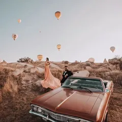 A classic car, a vintage vibe, and a stunning couple. This shot from Turkey shows how my gowns can be part of a larger creative vision for your pre-wedding photoshoot.