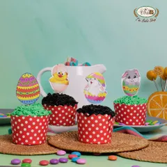 Our assorted Easter cupcakes come in vanilla, chocolate, and butterscotch flavors. They are topped with festive paper decorations featuring bunnies and eggs, perfect for an Easter party.