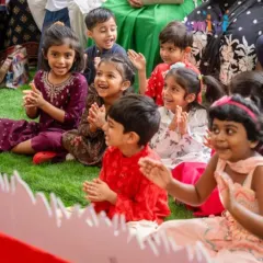 The pure joy on our children's faces as they clap and sing during our Grandparents' Day celebration. Events like these are central to our community, fostering connection and creating cherished memories for our families.