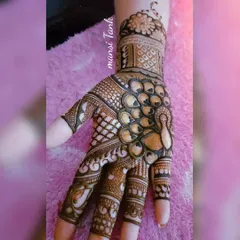 I love creating peacock designs. This one features a large, detailed peacock as the centerpiece on the back of the hand, with its feathers flowing gracefully.
