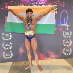 Holding the Indian flag high after winning at the Asia Pacific natural bodybuilding championship in Singapore. This was my return to the stage after a decade.