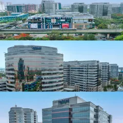 A wider perspective of the International Tech Park, showing multiple buildings and the connecting metro line. This contextualizes the property within its urban environment.