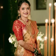 A beautiful smile from our bride in her red and gold Kanjivaram saree. We opted for a bold red lip and defined eyes to create a glamorous yet traditional South Indian bridal look.